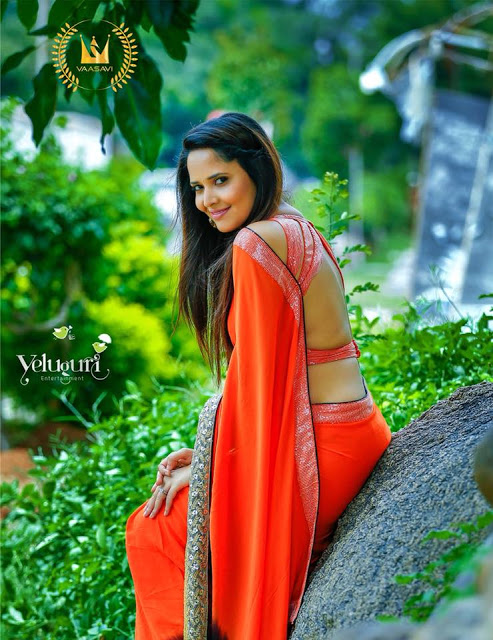 Gorgeous Indian TV Anchor Anasuya Hip Show In Orange Sari 40